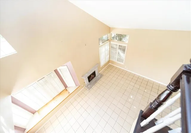 a view of a living room with washer and dryer