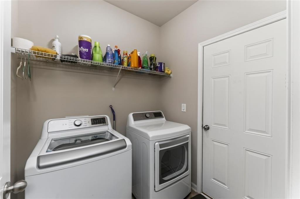 113 Tyson Woods Road Acworth, GA 30102 - Photo 25 of 37 a utility room with dryer and washer