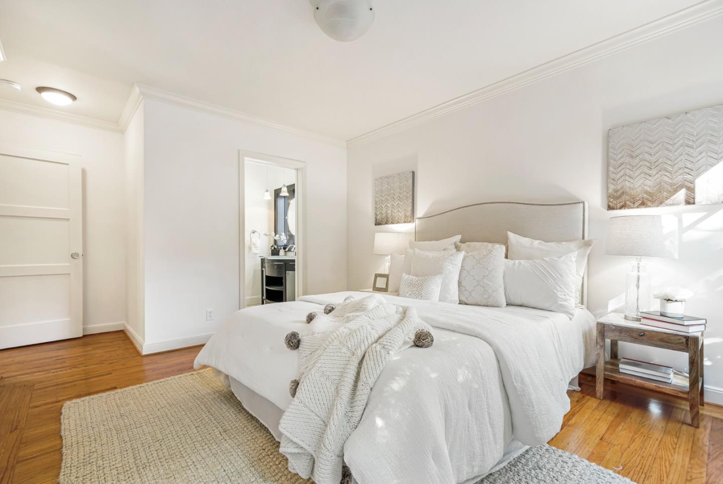 1149 Cortez Avenue Burlingame, CA 94010 - Photo 4 of 8 a bedroom with a bed and wooden floor