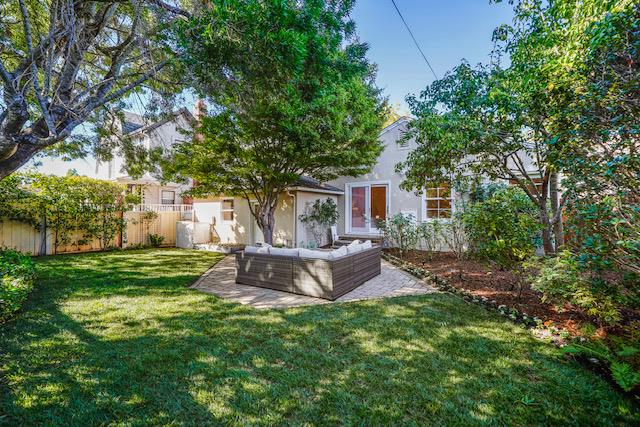 1149 Cortez Avenue Burlingame, CA 94010 - Photo 8 of 8 a view of a house with a backyard and a patio