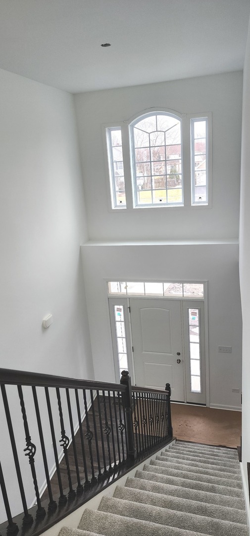 25624 Fieldstone Court Channahon, IL 60410 - Photo 9 of 15 a view of hallway with windows