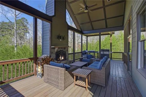 a balcony with trees in front of it