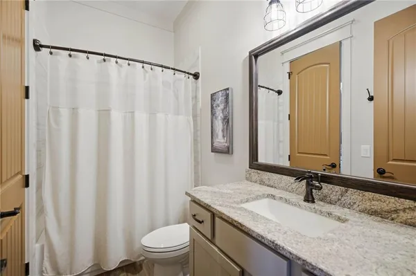 a view of a livingroom with furniture and window
