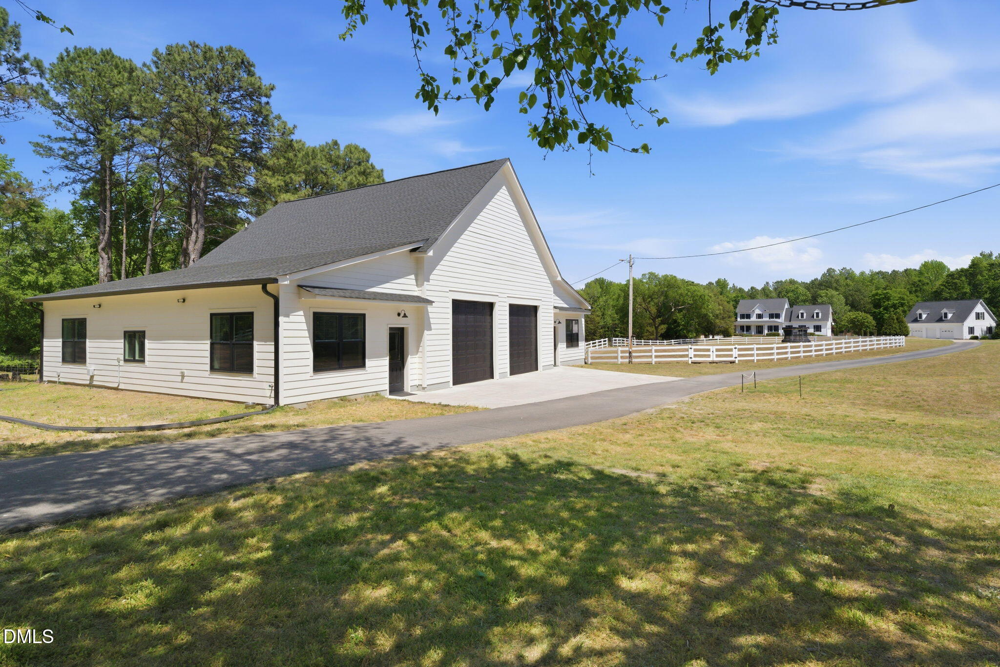 5416 Pulley Town Road Zebulon, NC 27597 - Photo 69 of 74 a front view of a house with a garden