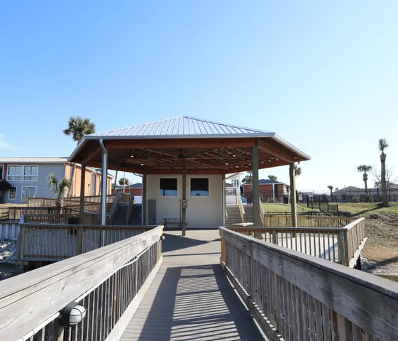 a view of a balcony with a potted plant
