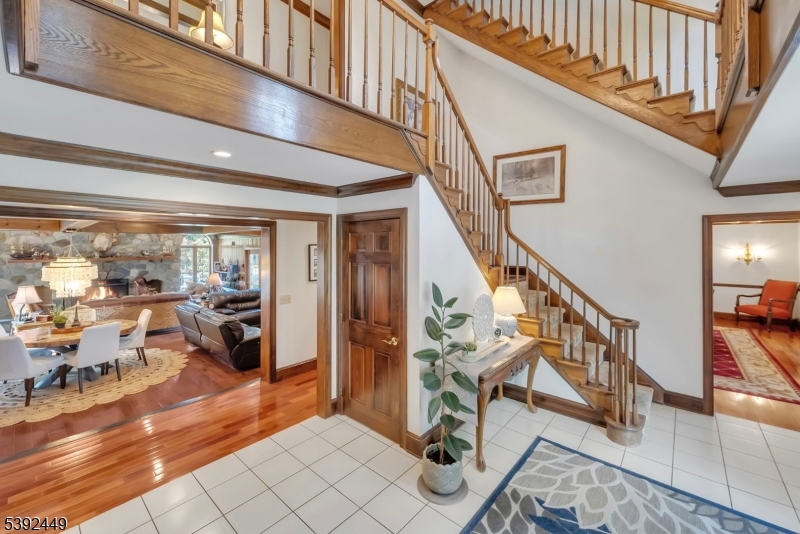 37 Pequest Road Andover, NJ 07821 - Photo 18 of 50 a view of entryway livingroom and hall with wooden floor