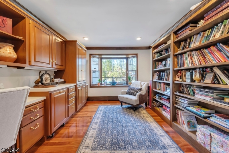 37 Pequest Road Andover, NJ 07821 - Photo 29 of 50 a open kitchen with stainless steel appliances granite countertop a refrigerator and a wooden floor
