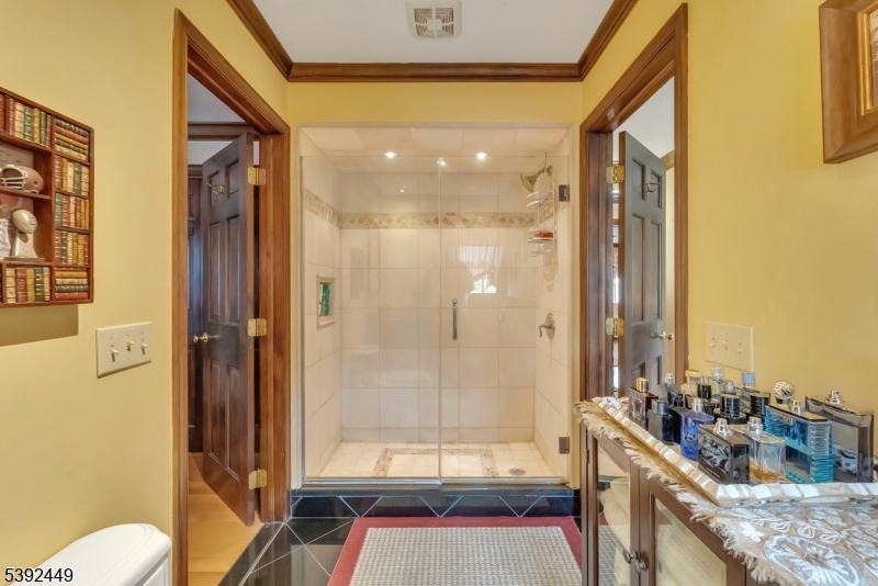 37 Pequest Road Andover, NJ 07821 - Photo 37 of 50 a bathroom with a tub and shower