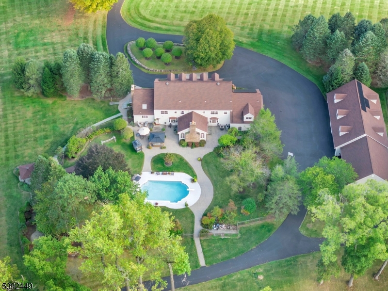 37 Pequest Road Andover, NJ 07821 - Photo 4 of 50 a aerial view of a house with a yard and green space