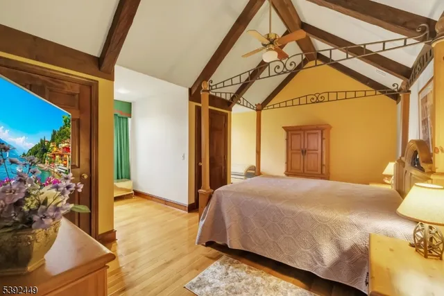 an aerial view of a house with outdoor space