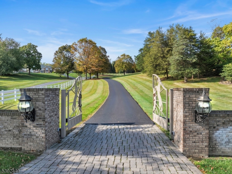 37 Pequest Road Andover, NJ 07821 - Photo 5 of 50 a view of a swimming pool with a patio