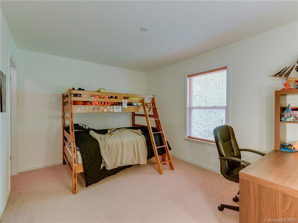 9502 Fernspray Road Charlotte, NC 28215 - Photo 10 of 20 a bedroom with furniture and a window