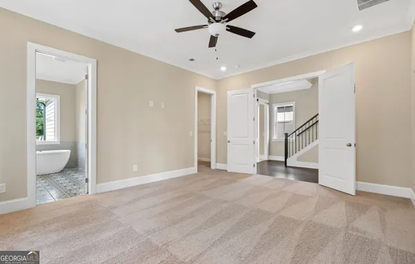 a bathroom with a bathtub and shower