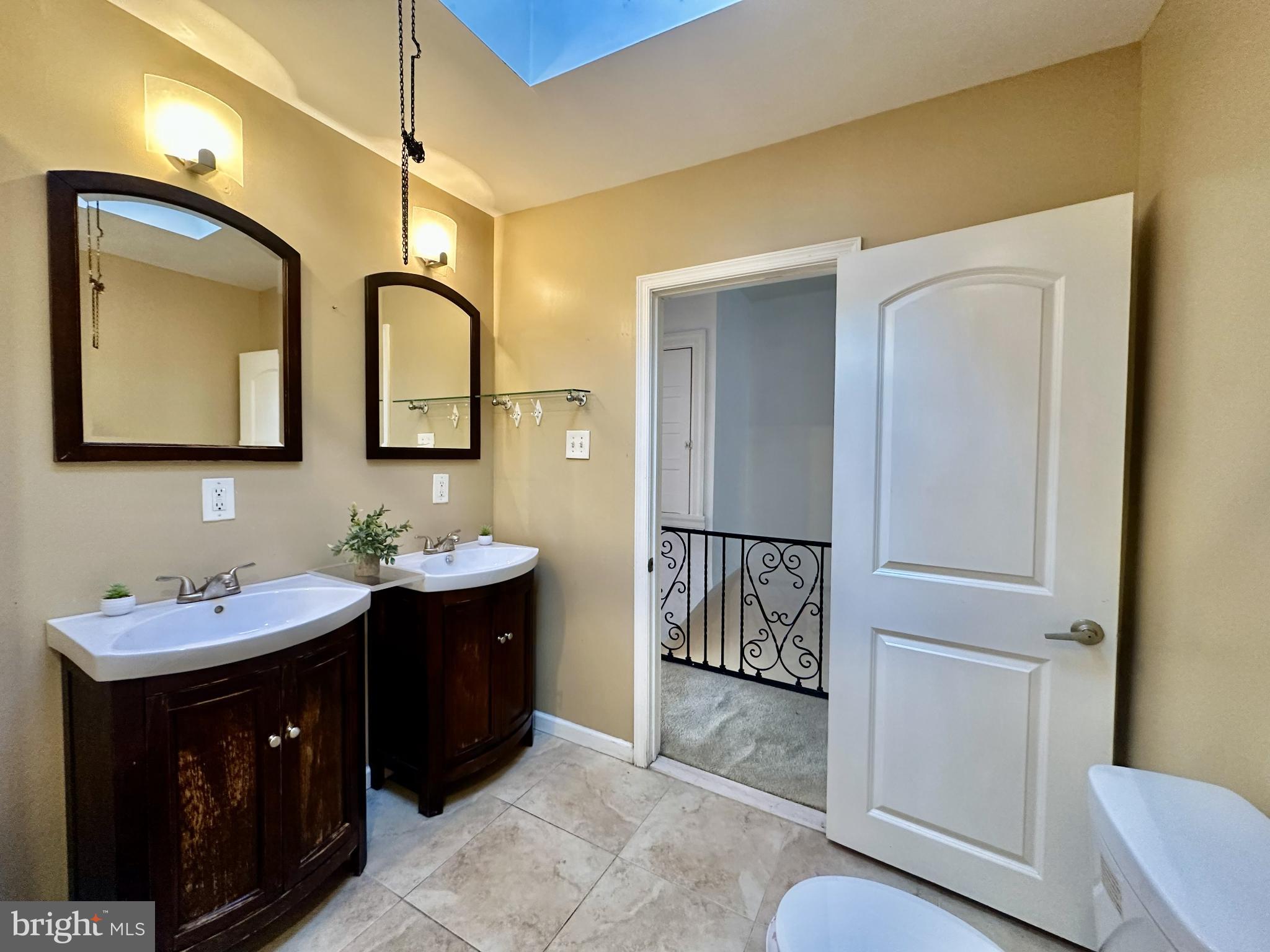329 Sanford Road Upper Darby, PA 19082 - Photo 13 of 19 a bathroom with a sink and a mirror