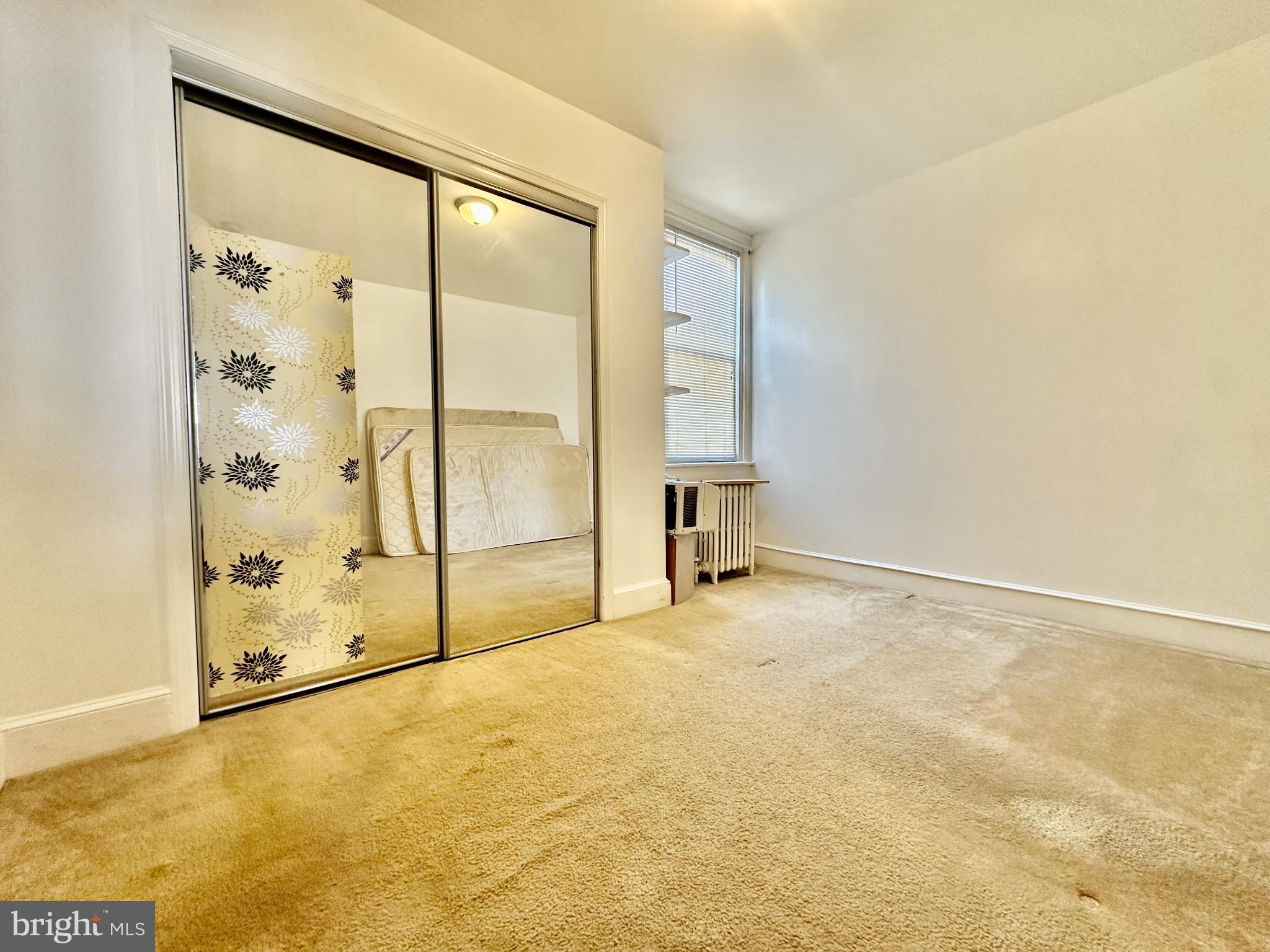 329 Sanford Road Upper Darby, PA 19082 - Photo 15 of 19 a view of an empty room with a window