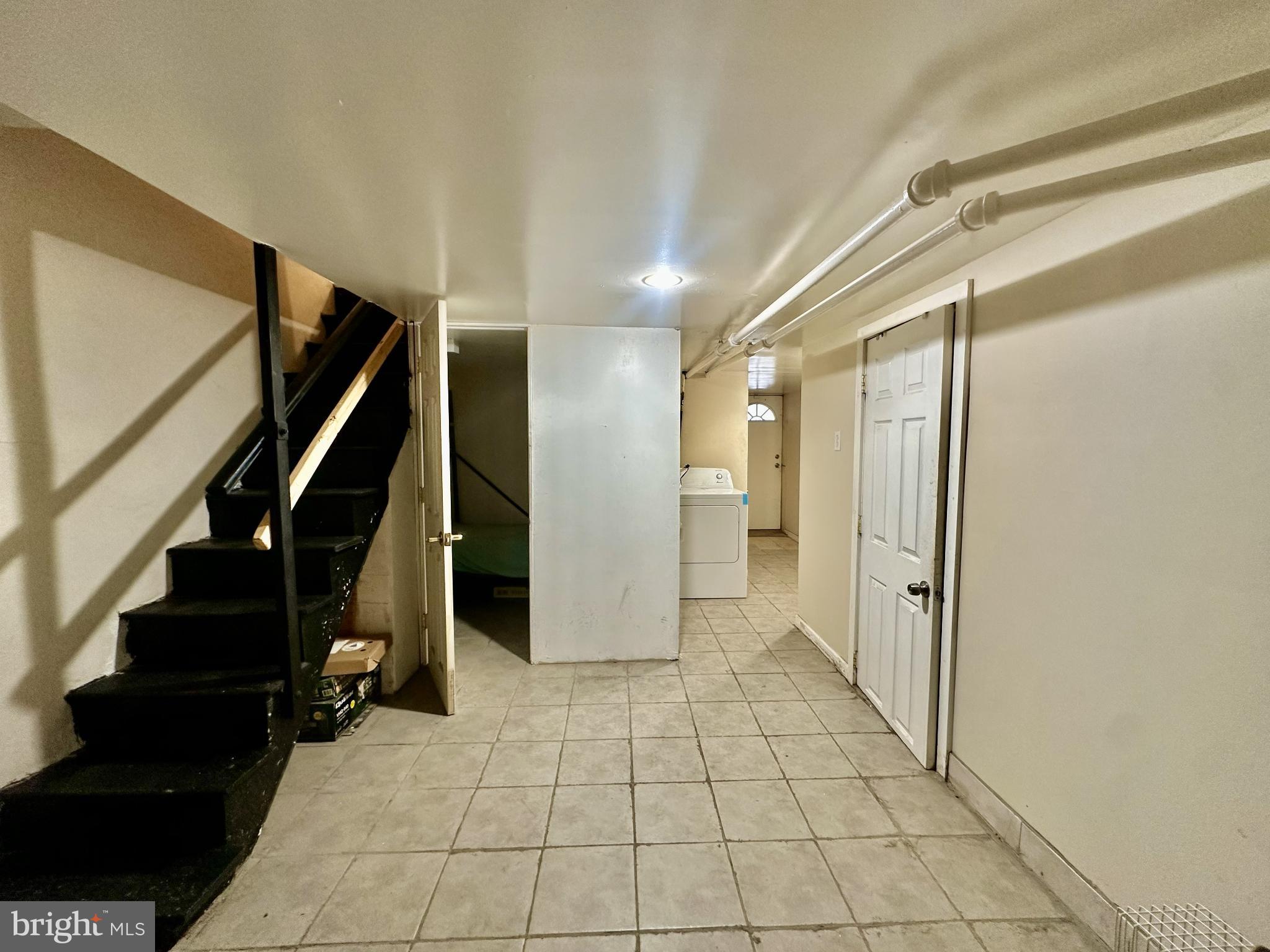 329 Sanford Road Upper Darby, PA 19082 - Photo 17 of 19 a view of entryway with stairs and a rug