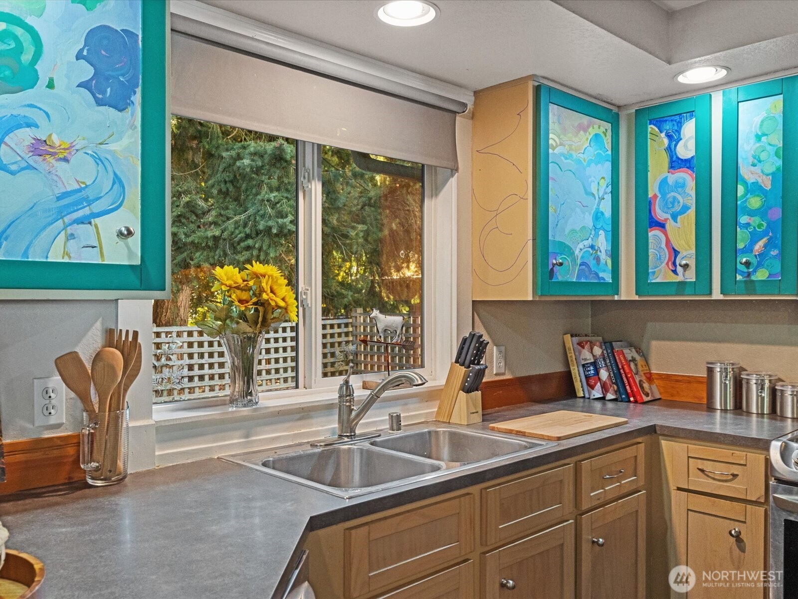 900 116th Street Southwest Everett, WA 98204 - Photo 13 of 40 a kitchen with a sink and a large window