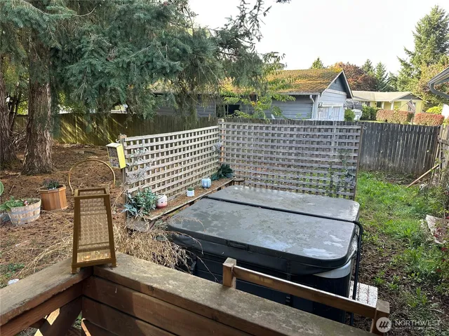a backyard of a house with lots of green space