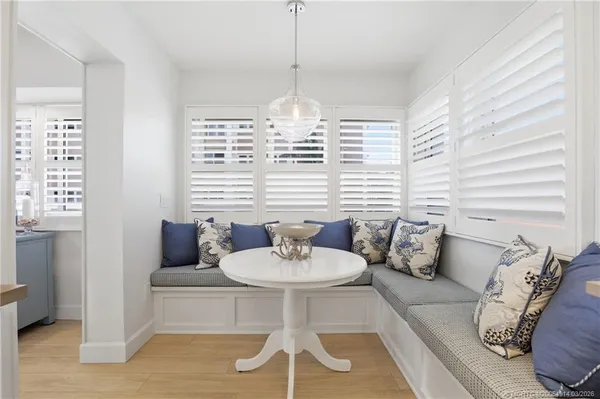 a bathroom with a shower and a sink