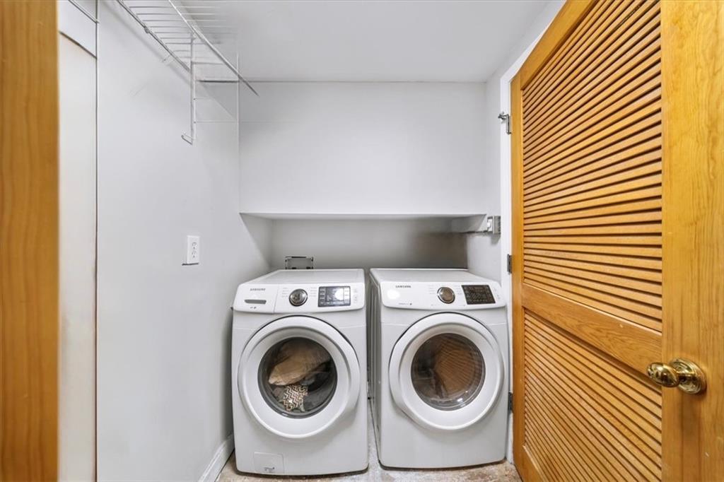 330 Peters Street Southwest, Unit 105 Atlanta, GA 30313 - Photo 20 of 27 a utility room with dryer and washer