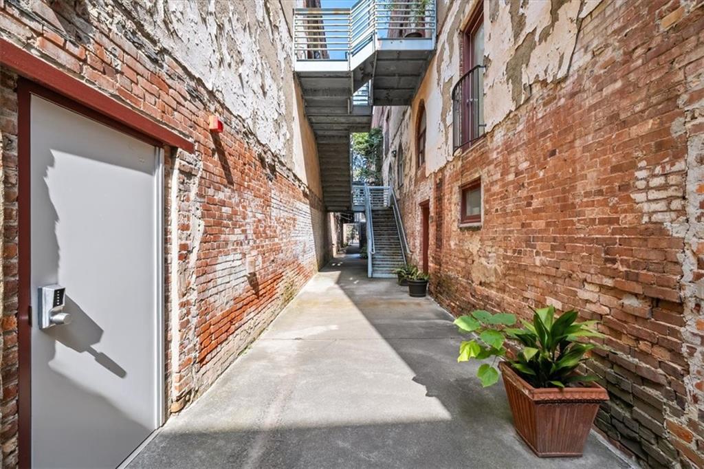 330 Peters Street Southwest, Unit 105 Atlanta, GA 30313 - Photo 2 of 27 a view of a pathway along the building