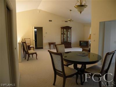 1287 Sand Castle Road Sanibel, FL 33957 - Photo 2 of 9 a view of a dining room with furniture and a chandelier