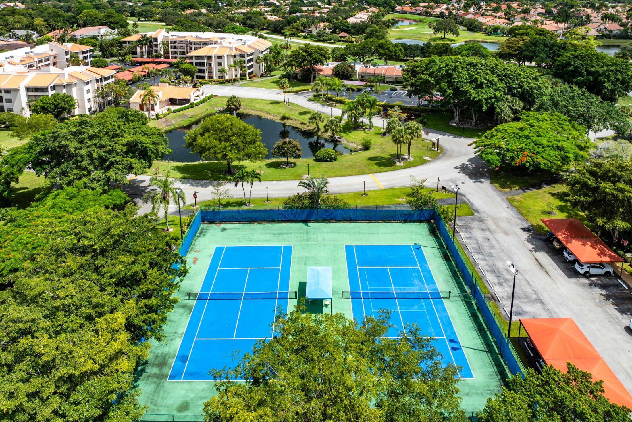 7546 La Paz Boulevard, Unit 404 Boca Raton, FL 33433 - Photo 39 of 47 an aerial view of swimming pool