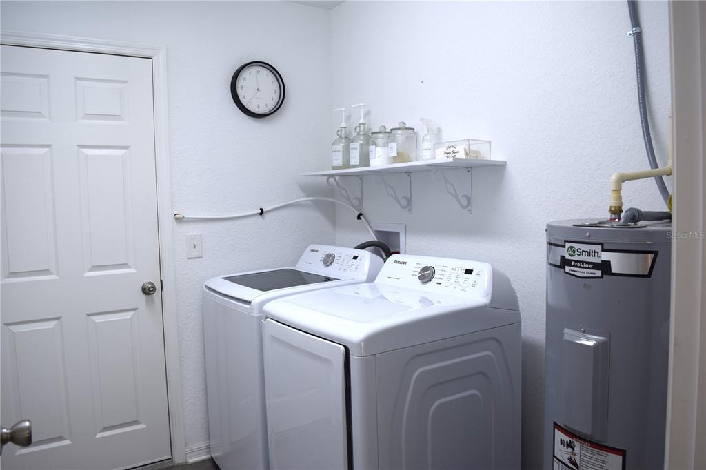 3184 Southwest 151st Avenue Ocala, FL 34481 - Photo 15 of 17 a utility room with dryer and washer