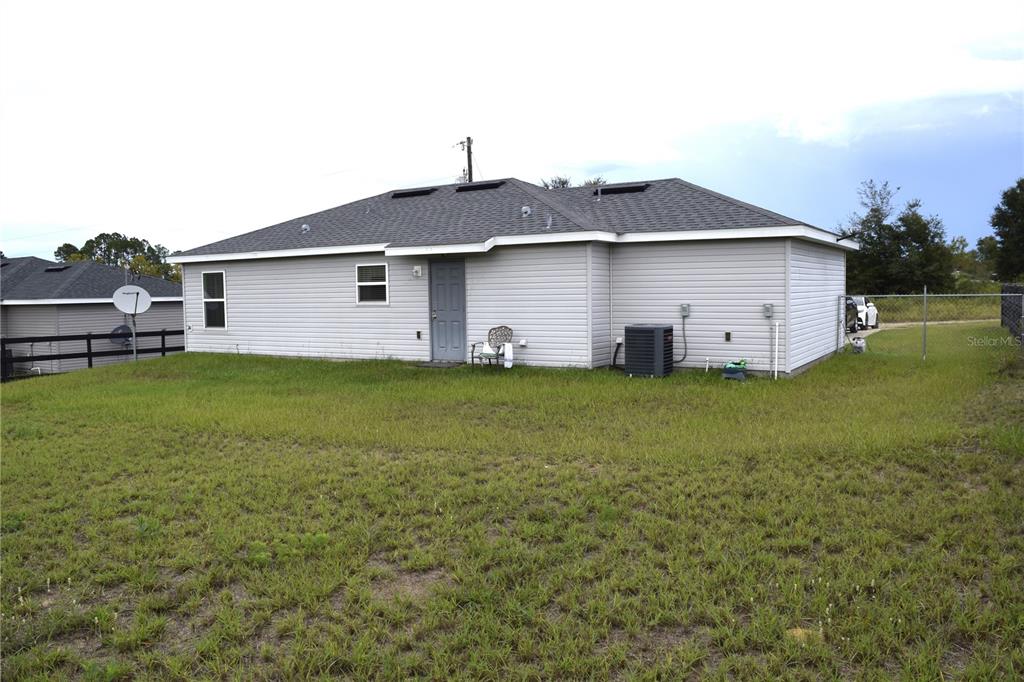 3184 Southwest 151st Avenue Ocala, FL 34481 - Photo 5 of 17 a house view with a garden