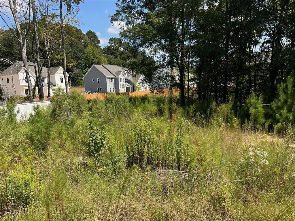 2960 Macland Road Marietta, GA 30064 - Photo 7 of 14 a backyard of a house with lots of green space