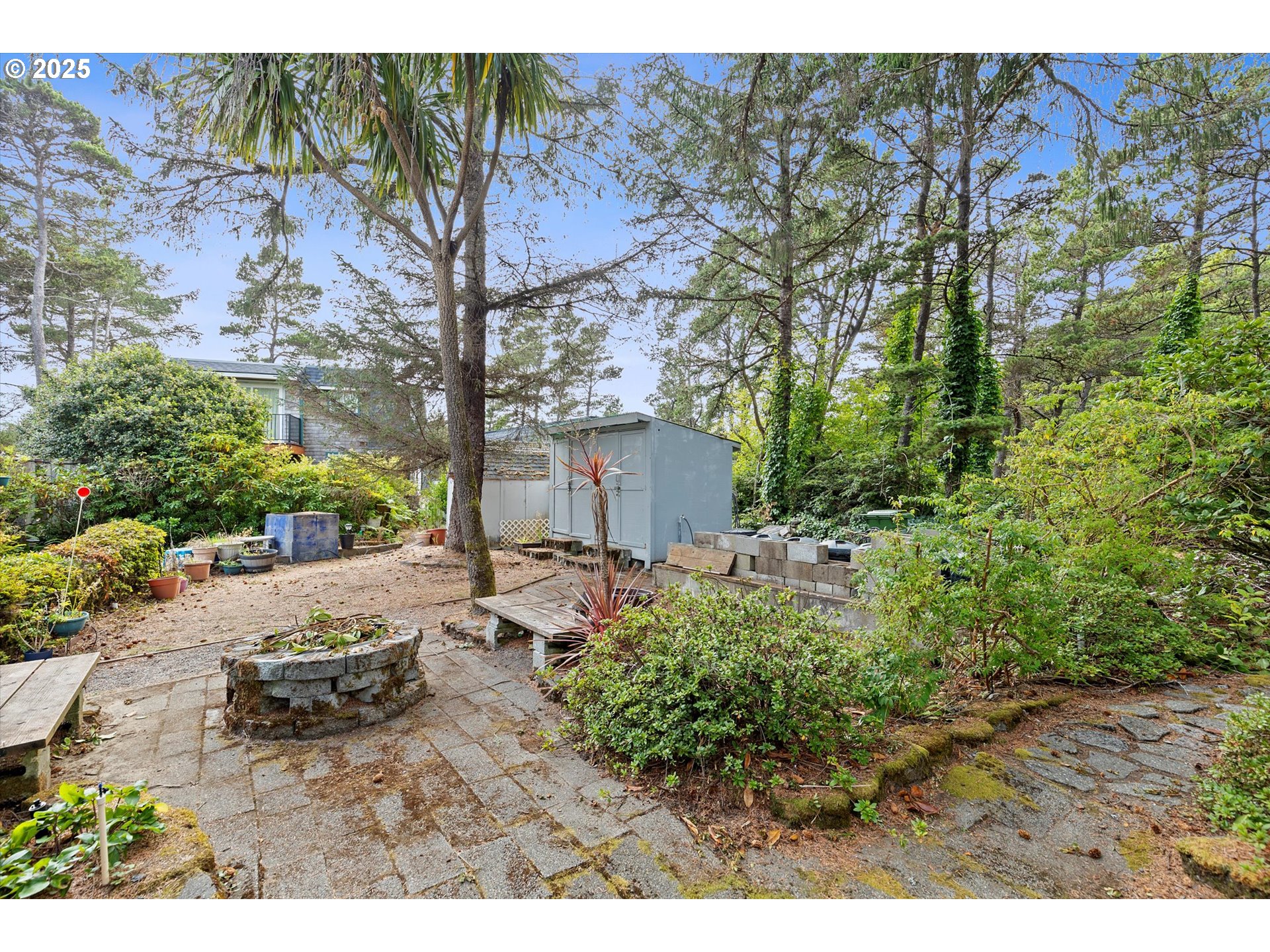 5825 Roma Avenue Cloverdale, OR 97112 - Photo 27 of 44 a backyard of a house with a yard and outdoor seating