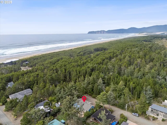 an aerial view of residential house with outdoor space