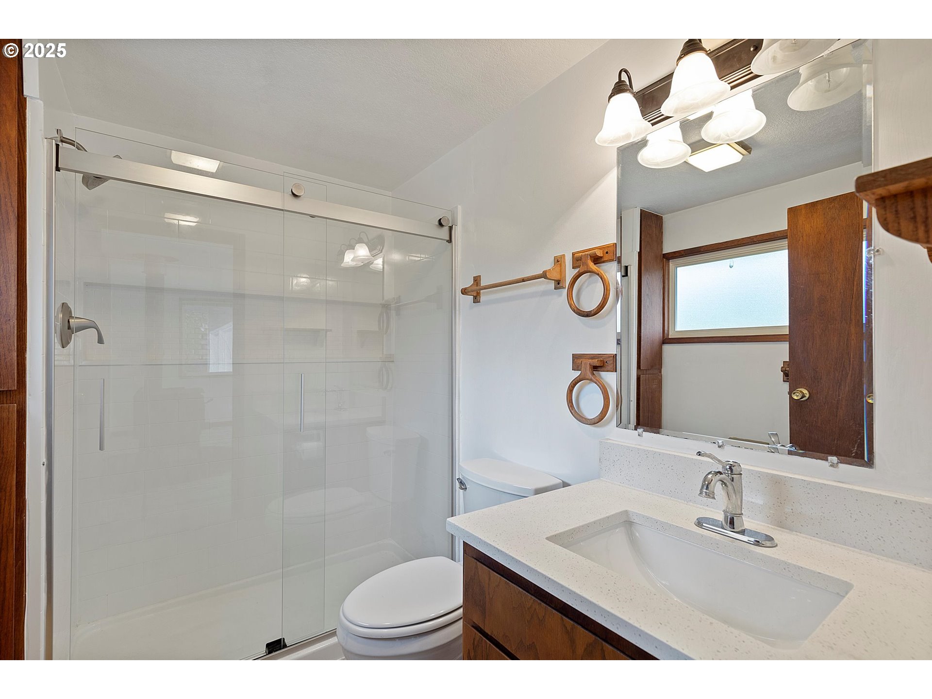 5825 Roma Avenue Cloverdale, OR 97112 - Photo 10 of 44 a bathroom with a sink a toilet and a mirror