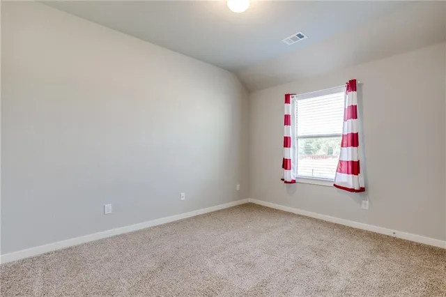 an empty room with closet