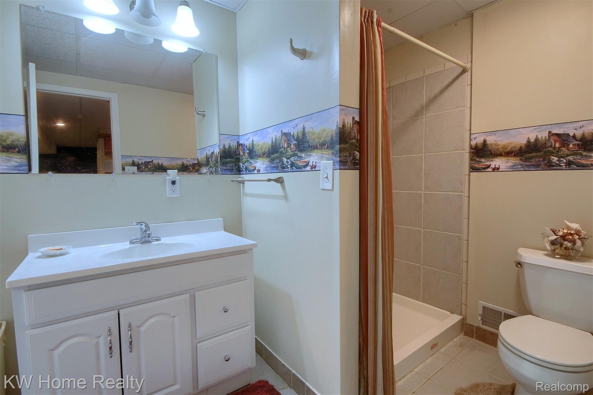 22441 Timber Ridge Court Trenton, MI 48183 - Photo 26 of 29 26-Finished Lower Level Bathroom.jpg