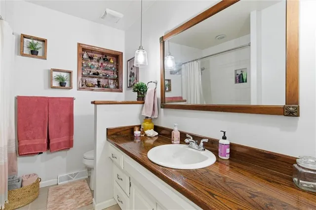 $399,999 | 308 Southeast Colony Drive, Lee's Summit, MO 64063