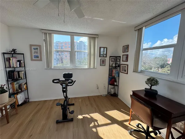 a room with furniture and a window