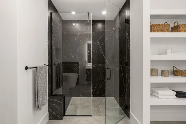 a bathroom with a bathtub and a sink