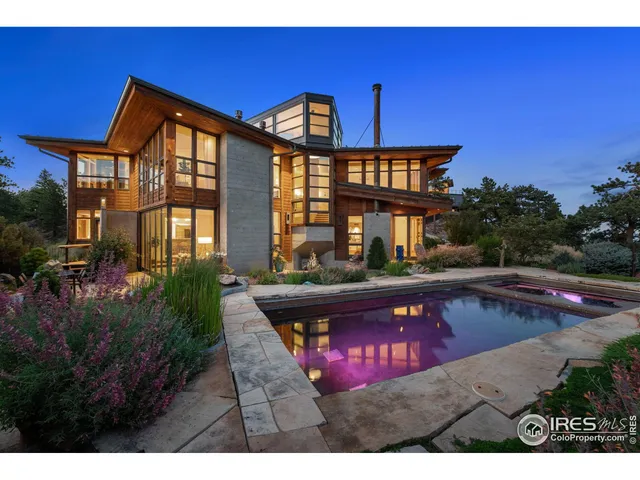 a front view of a house with swimming pool