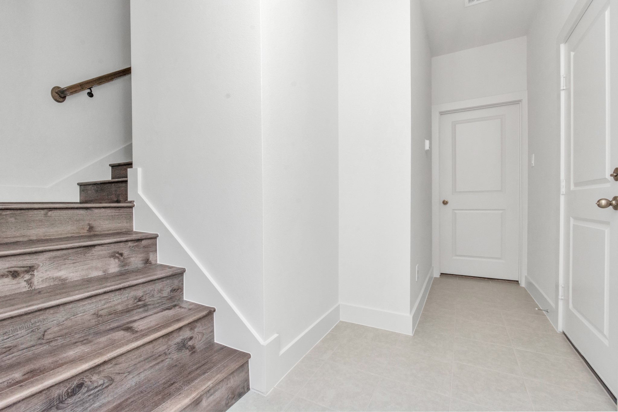2011 East Bauer Drive Houston, TX 77080 - Photo 3 of 32 a view of an entryway with staircase