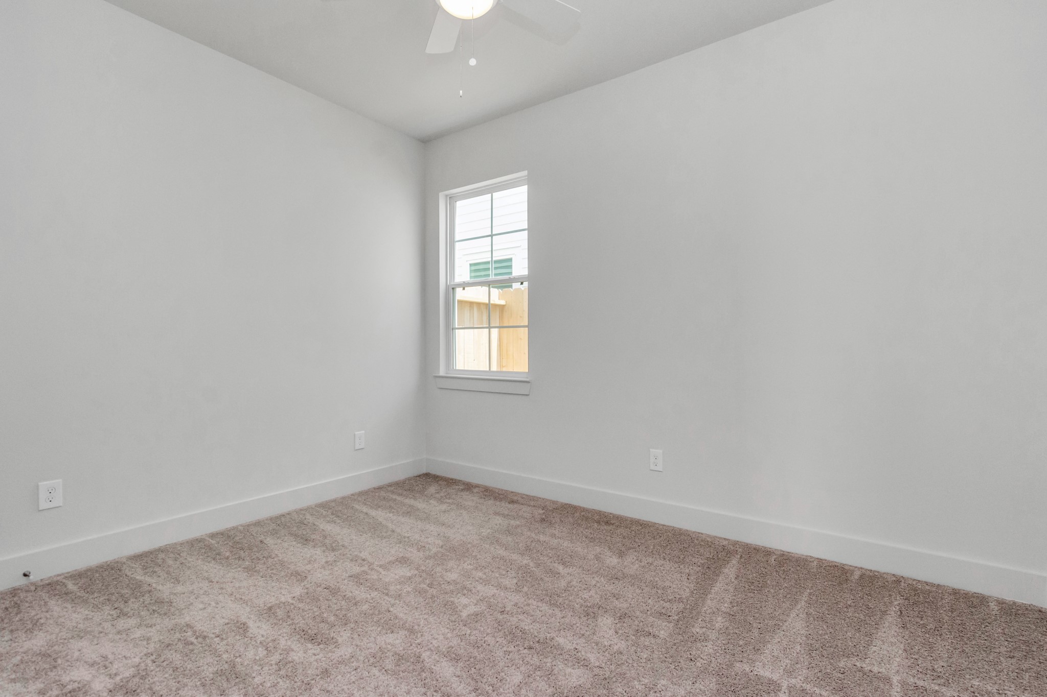 2011 East Bauer Drive Houston, TX 77080 - Photo 4 of 32 an empty room with a window