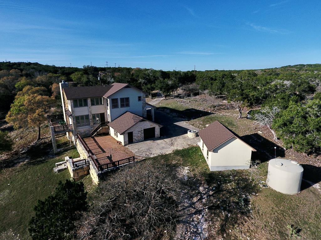 475 River Bend Road West Hunt, TX 78024 - Photo 11 of 87 an aerial view of a house with a garden