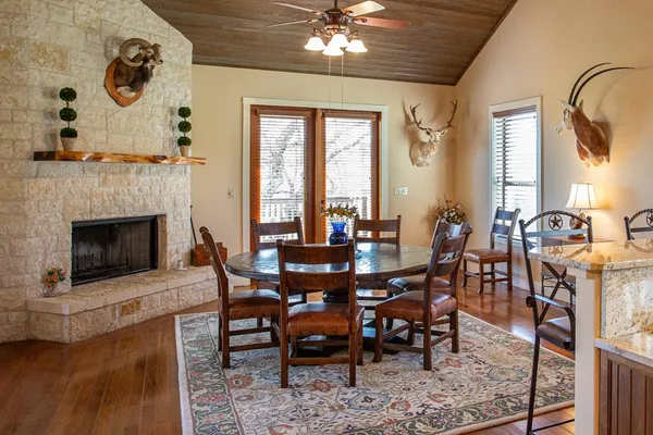 a bedroom with a large bed and a dresser