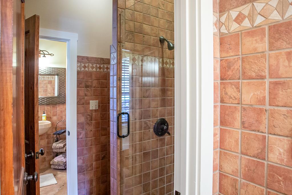 475 River Bend Road West Hunt, TX 78024 - Photo 27 of 87 a bathroom with a shower