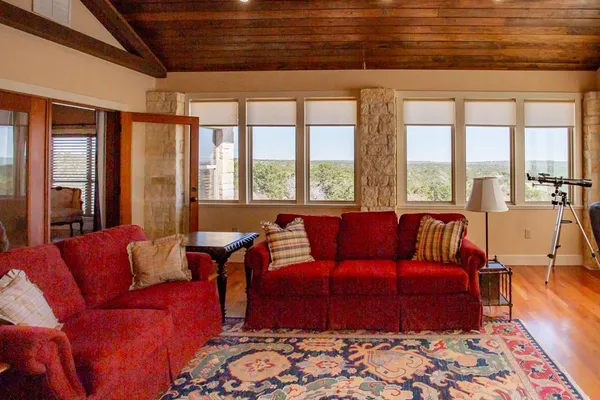 a front view of a house with a big yard