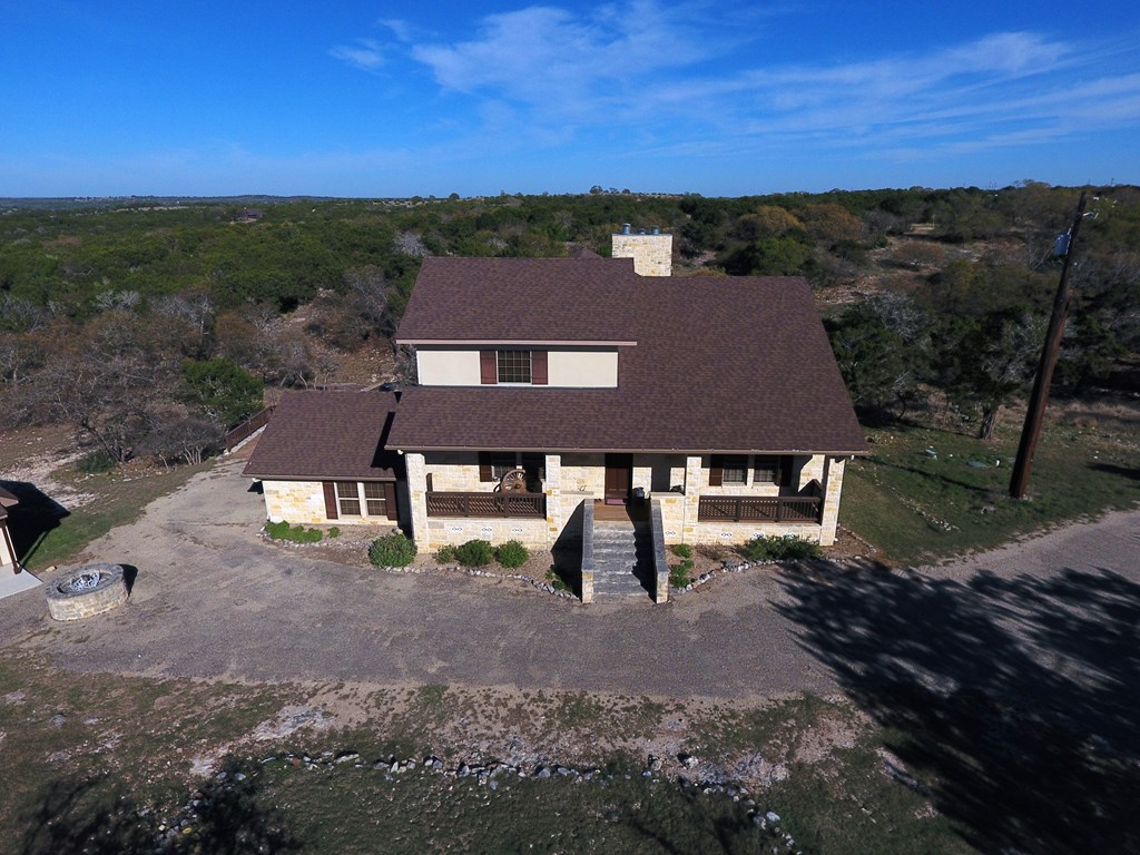 475 River Bend Road West Hunt, TX 78024 - Photo 82 of 87 a view of a house with a yard