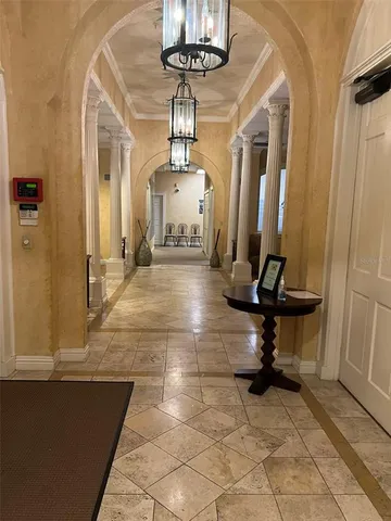 a room with gym equipment and a large window