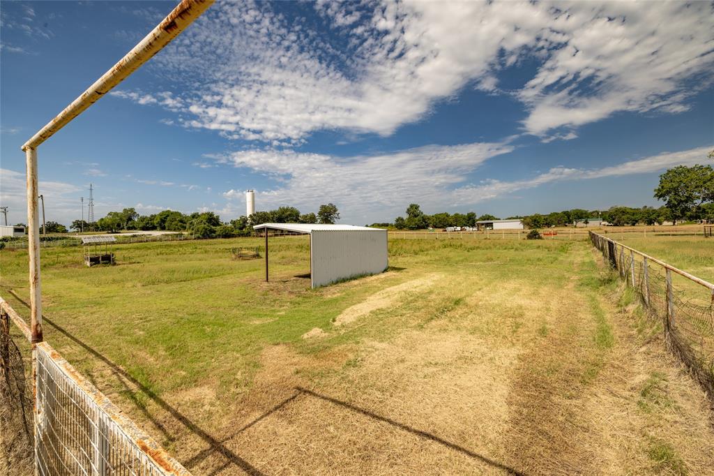 207 Lazy B Lane Springtown, TX 76082 - Photo 31 of 39 View of yard featuring a rural view