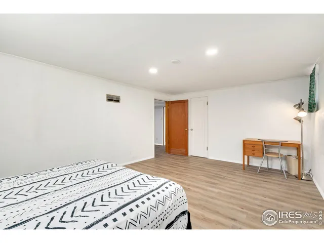 a view of a livingroom with wooden floor