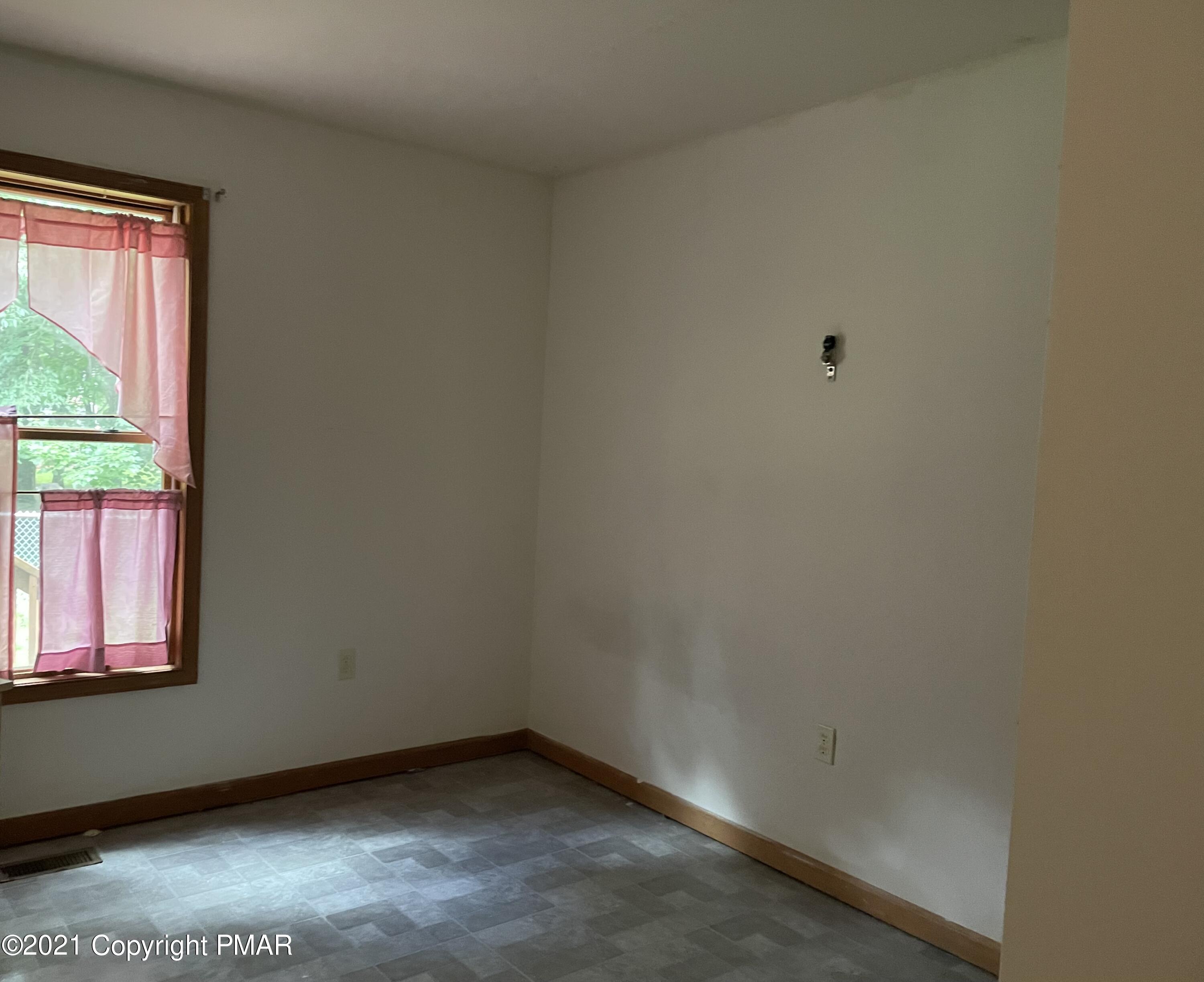 3294 Red Run Road Pocono Summit, PA 18346 - Photo 18 of 36 an empty room with a window